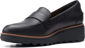 Clarks womens Sharon Gracie Penny Loafer, Black Leather With Dark Tan Welt, 6 US