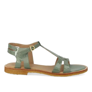 Feminine sandal with strap design